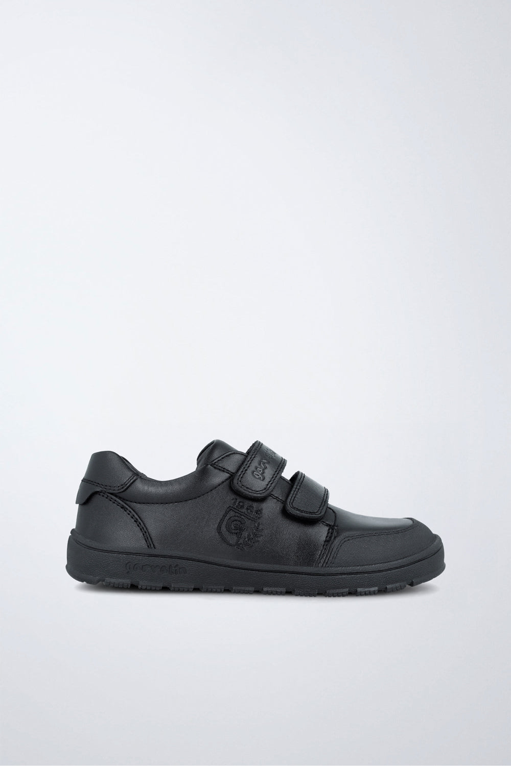 Zapatos escolares Garvalín respetuoso en negro con cierre de contacto y puntera reforzada.