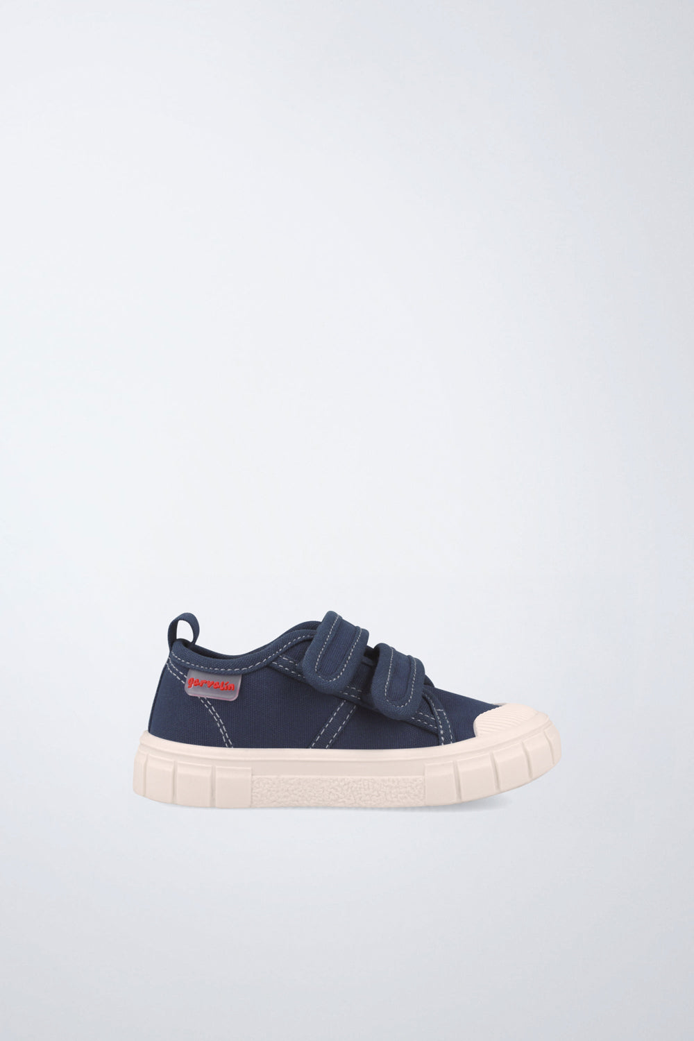 Zapatilla casual Garvalín barefoot en azul marino con cierre ajustable y suela flexible.