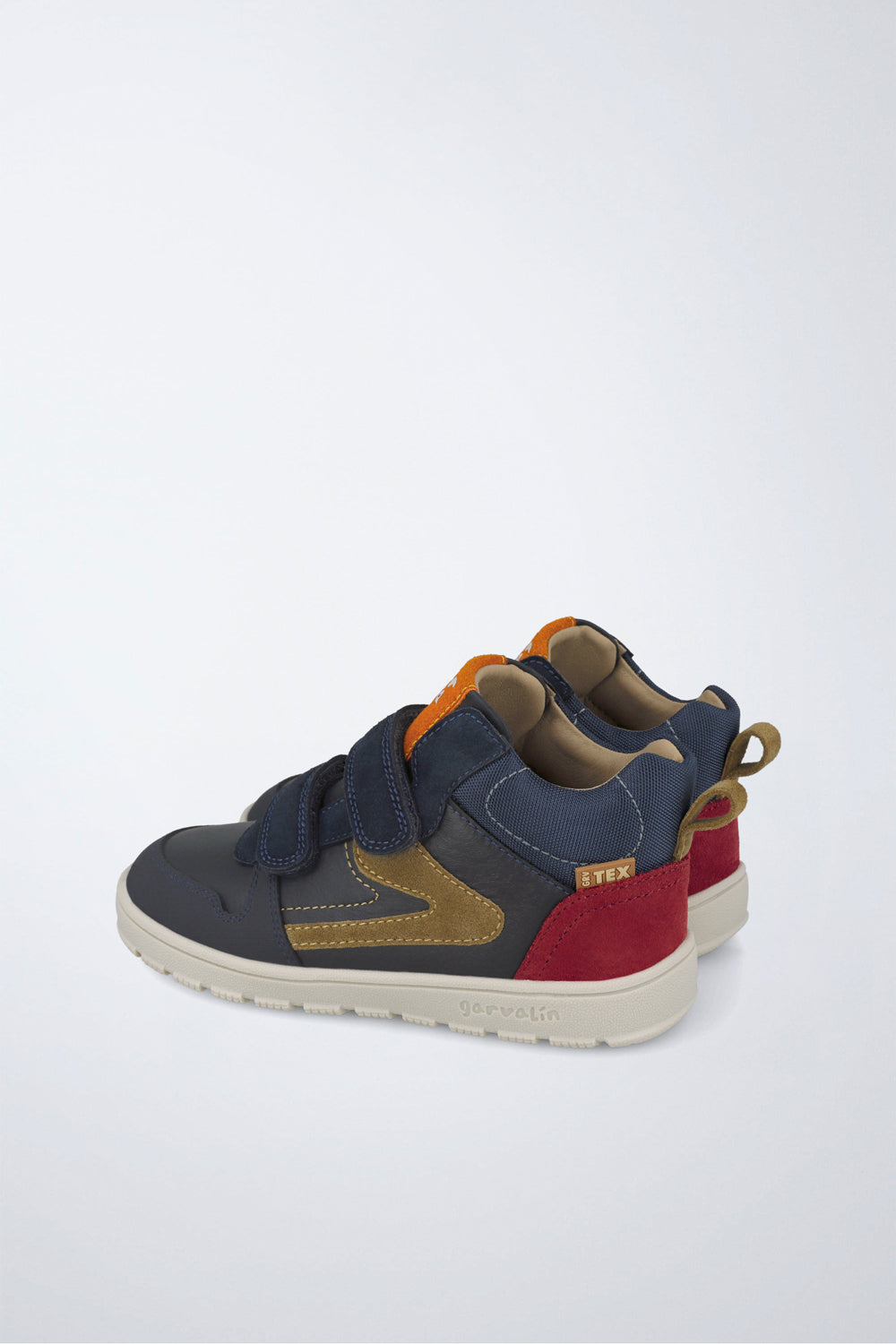 Barefoot Garvalín ankle boot in navy and red with an adjustable fastening and a flexible sole.