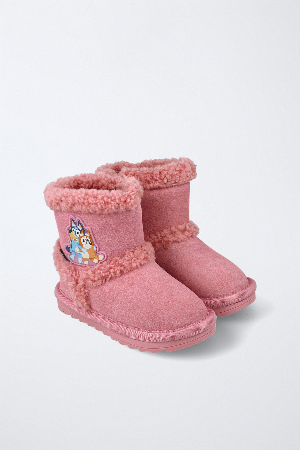 Bota infantil Garvalín respetuosa en rosa con cremallera y suela flexible.