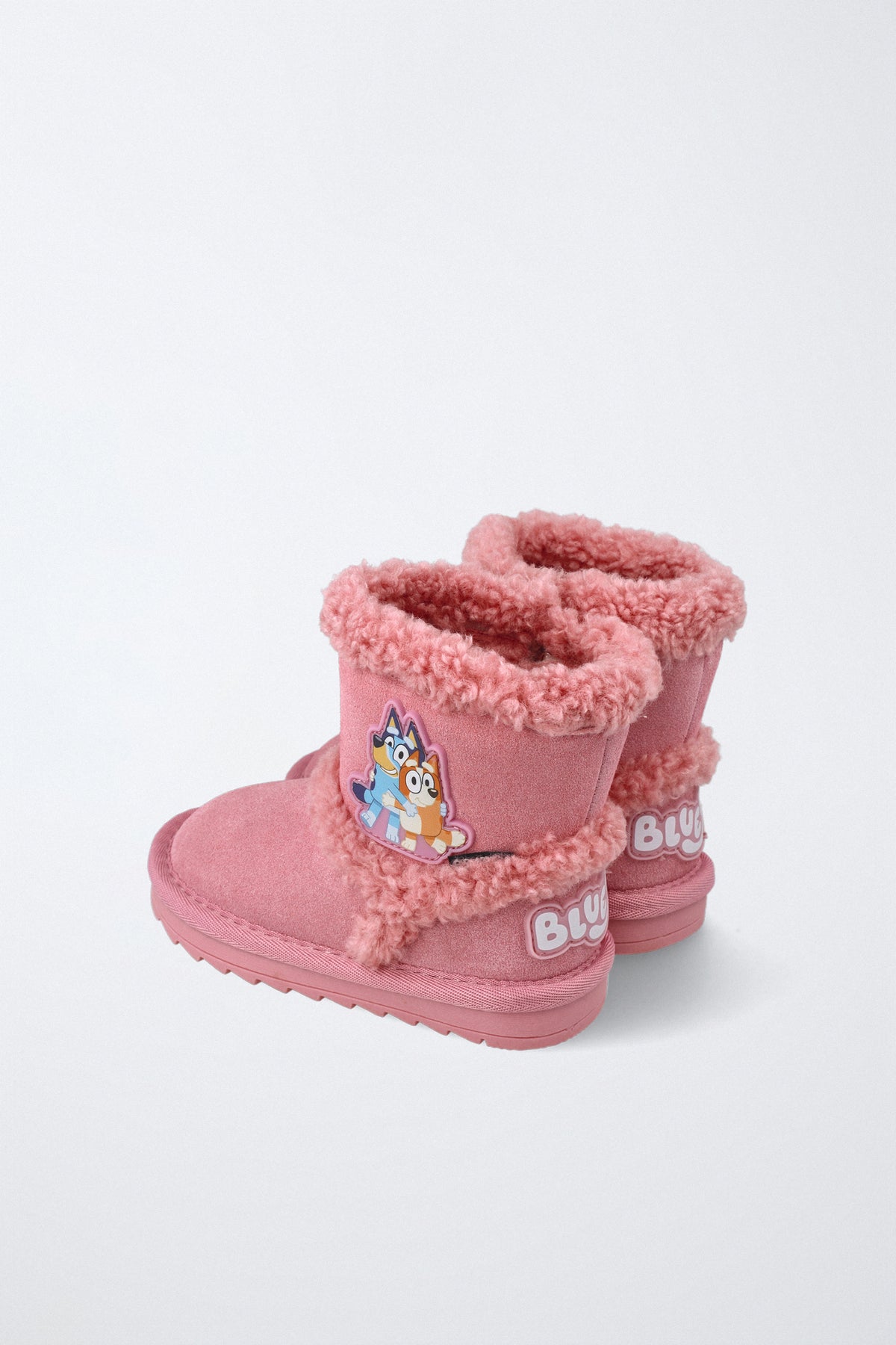 Bota infantil Garvalín respetuosa en rosa con cremallera y suela flexible.
