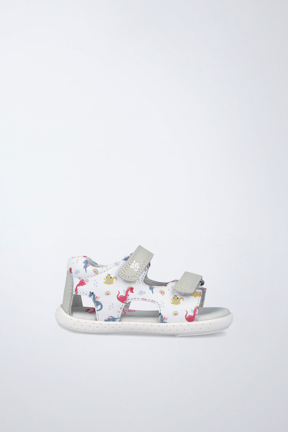 Sandalia infantil Garvalín barefoot en blanco con cierre de contacto y desarrollo natural del pie.
