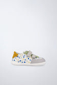 Zapatilla barefoot de textil flexible en blanco