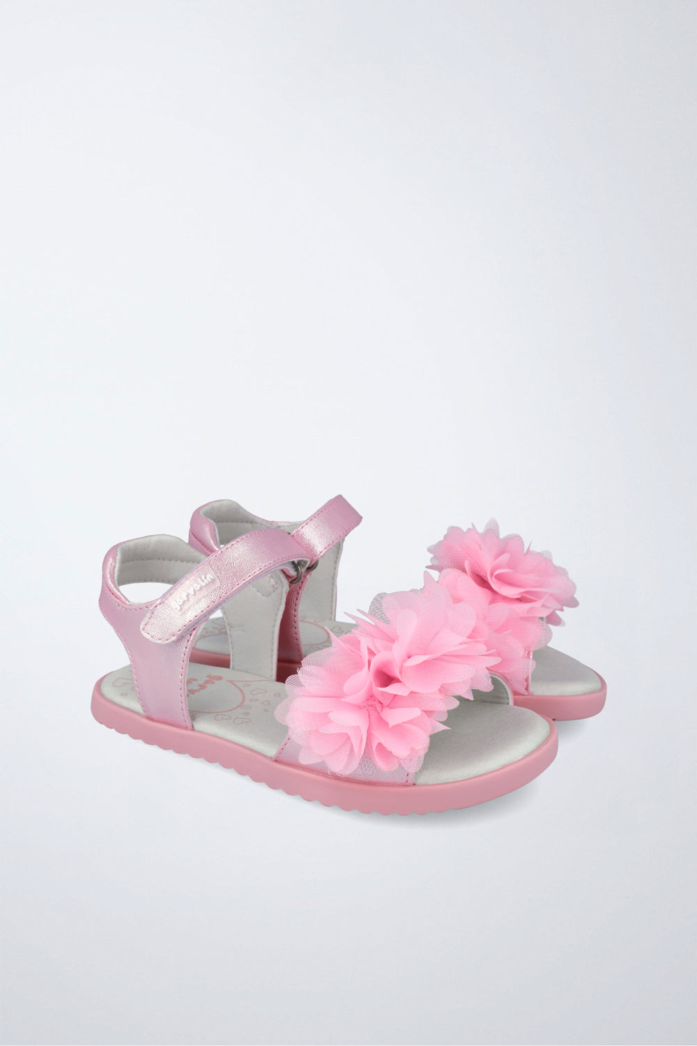 Sandalia Garvalín barefoot en rosa con cierre de contacto y diseño ergonómico.