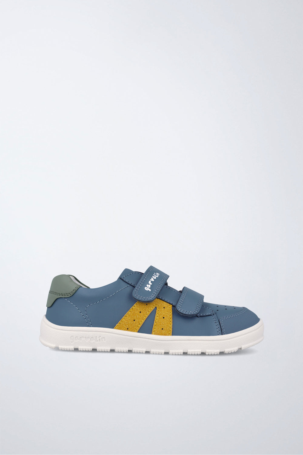 Zapato Garvalín barefoot en azul y amarillo con cierre de contacto y flexibilidad para el movimiento natural del pie.