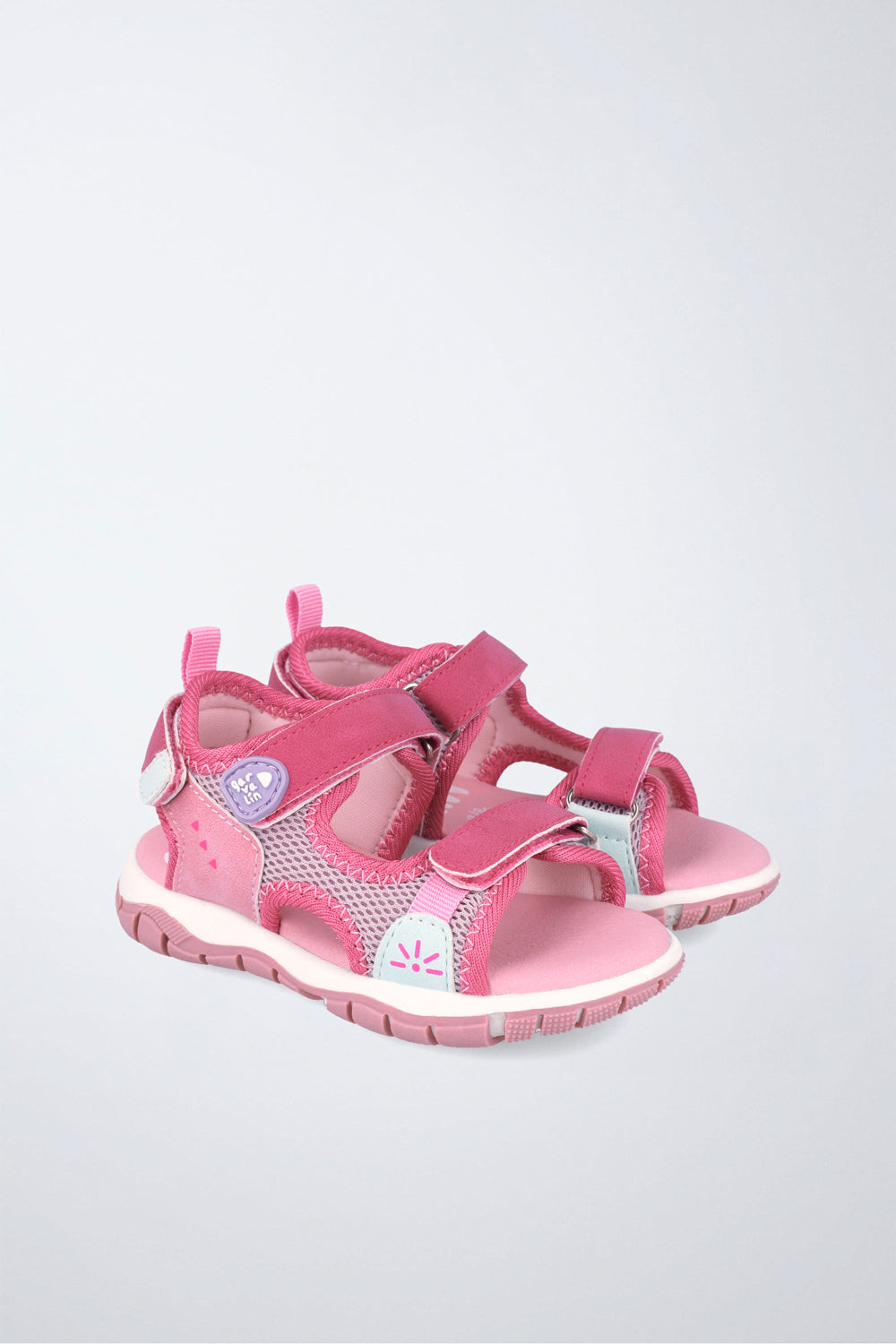 Sandalia infantil Garvalín respetuosa en rosa con cierre de contacto y desarrollo natural del pie.