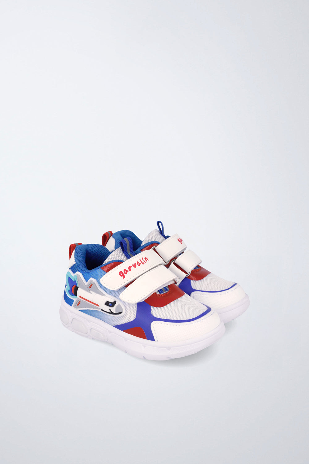 Deportivo infantil Garvalín respetuoso en blanco con cierre de contacto y estabilidad y flexibilidad.